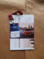 Jaguar XE News Presseberichte + Halsband +Testfahrtschild